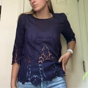 Beautiful purple blouse with embroidered cutouts
